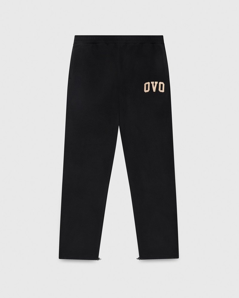 pantaloni della tuta con orlo aperto e logo ovo arch di october neri