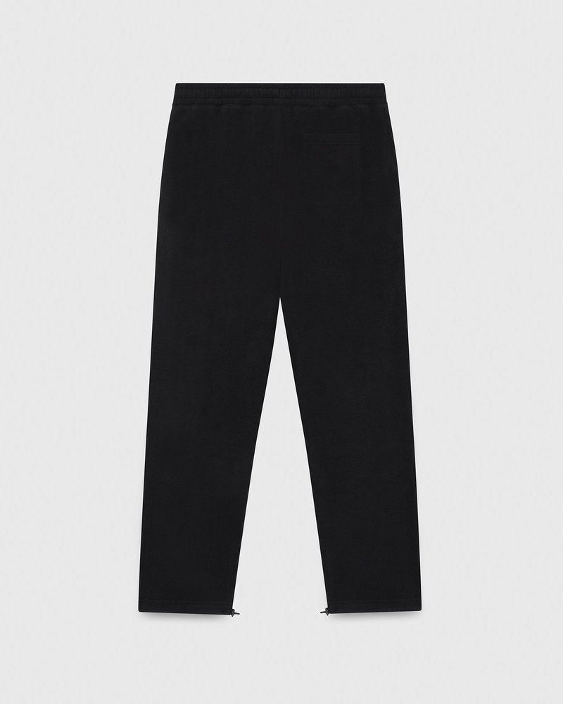 pantaloni della tuta con orlo aperto e logo ovo arch di october neri