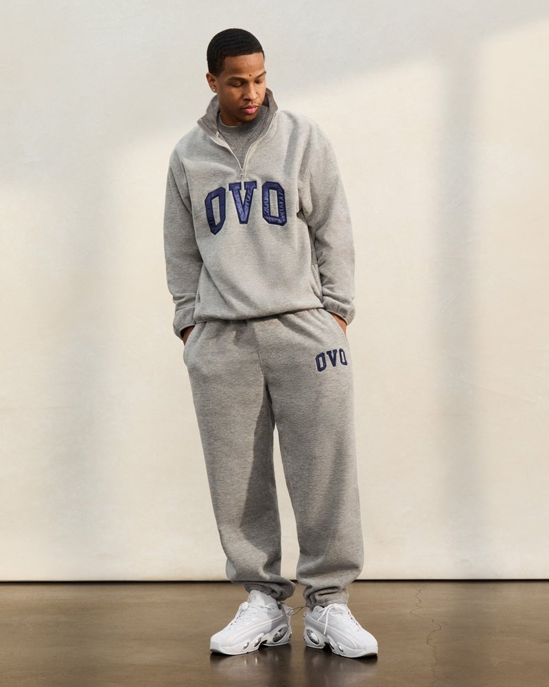 pantaloni della tuta con orlo aperto e logo ovo arch di october grigi